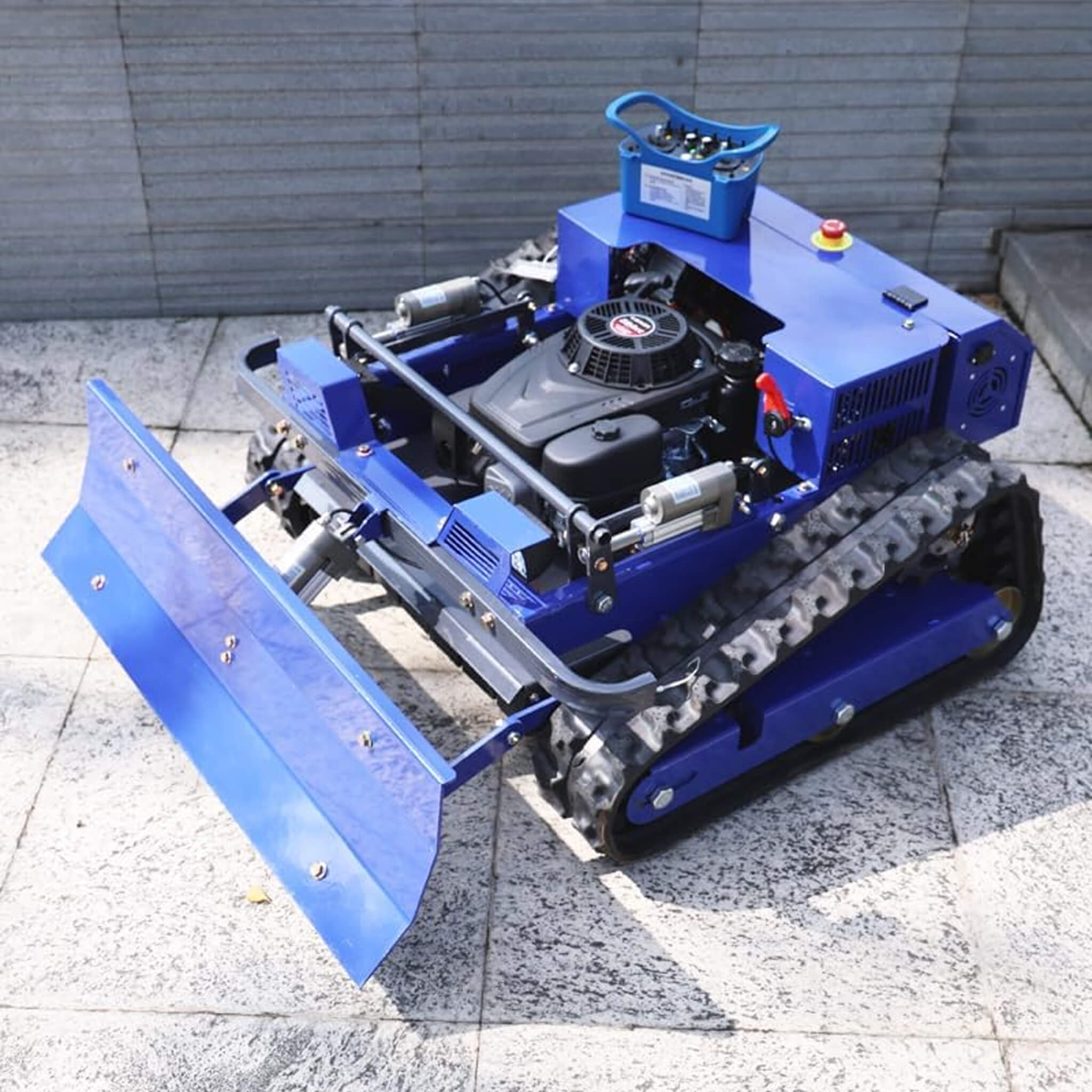 heavy-duty-commercial-remote-controlled-lawn-mower-with-snow-plow-sak85214-lifestyle-front-left-view.jpg